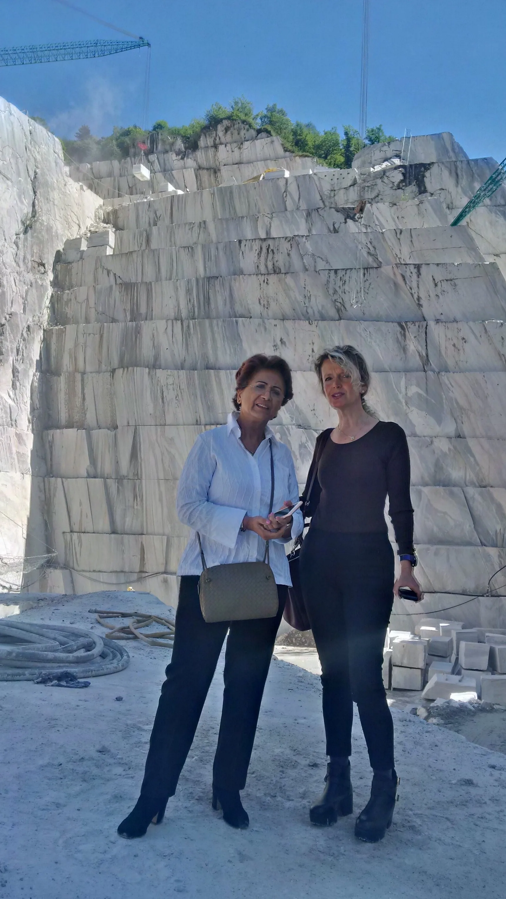 Rupy Shah with Flavia, her Italian quarry partner, at a Palisandro marble quarry